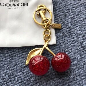 Coach Gold-Tone Cherry Keychain with Red Glitter Cherries